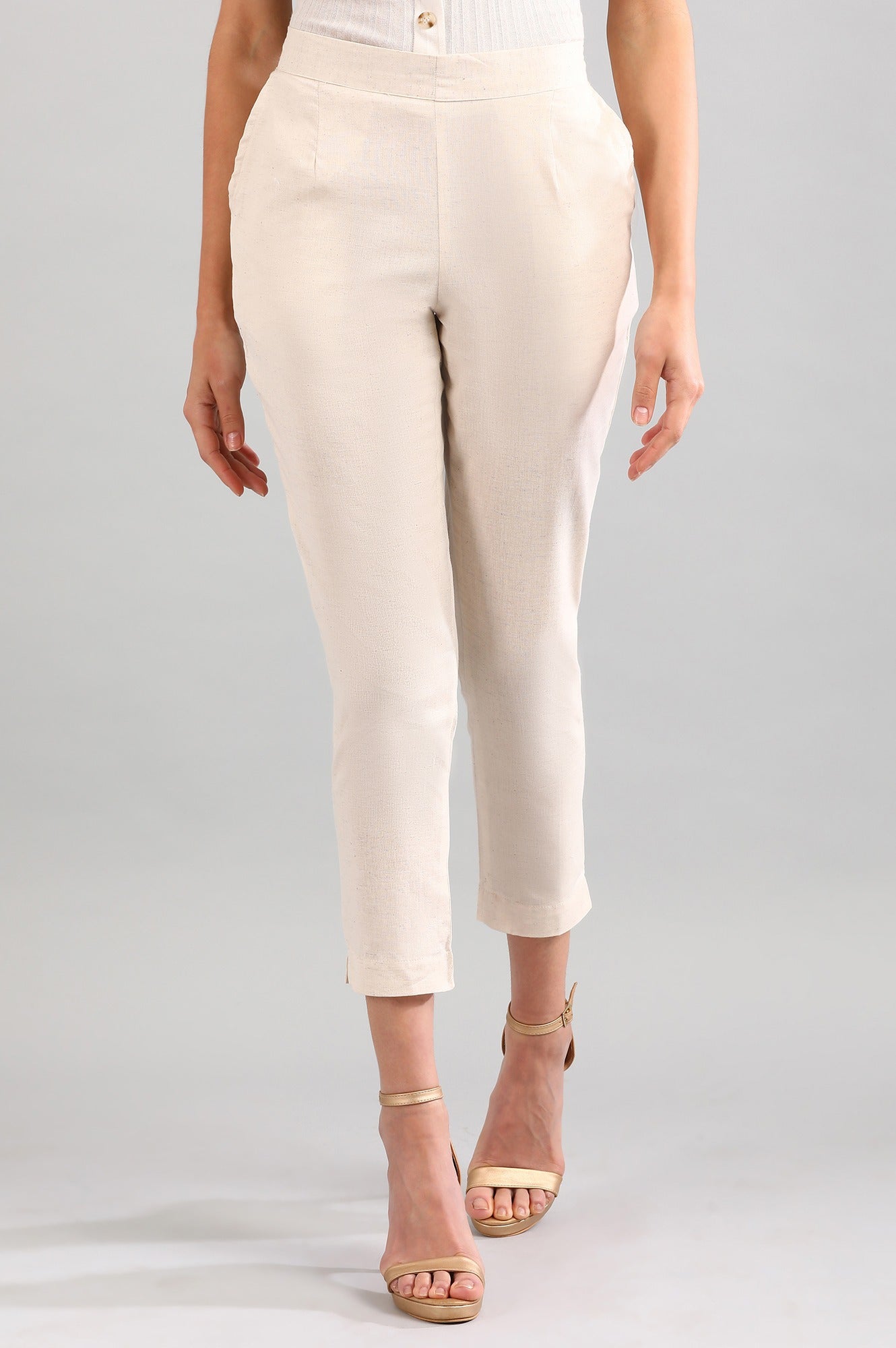 Beige Solid Straight Fit Cotton Trousers With Elasticated Back