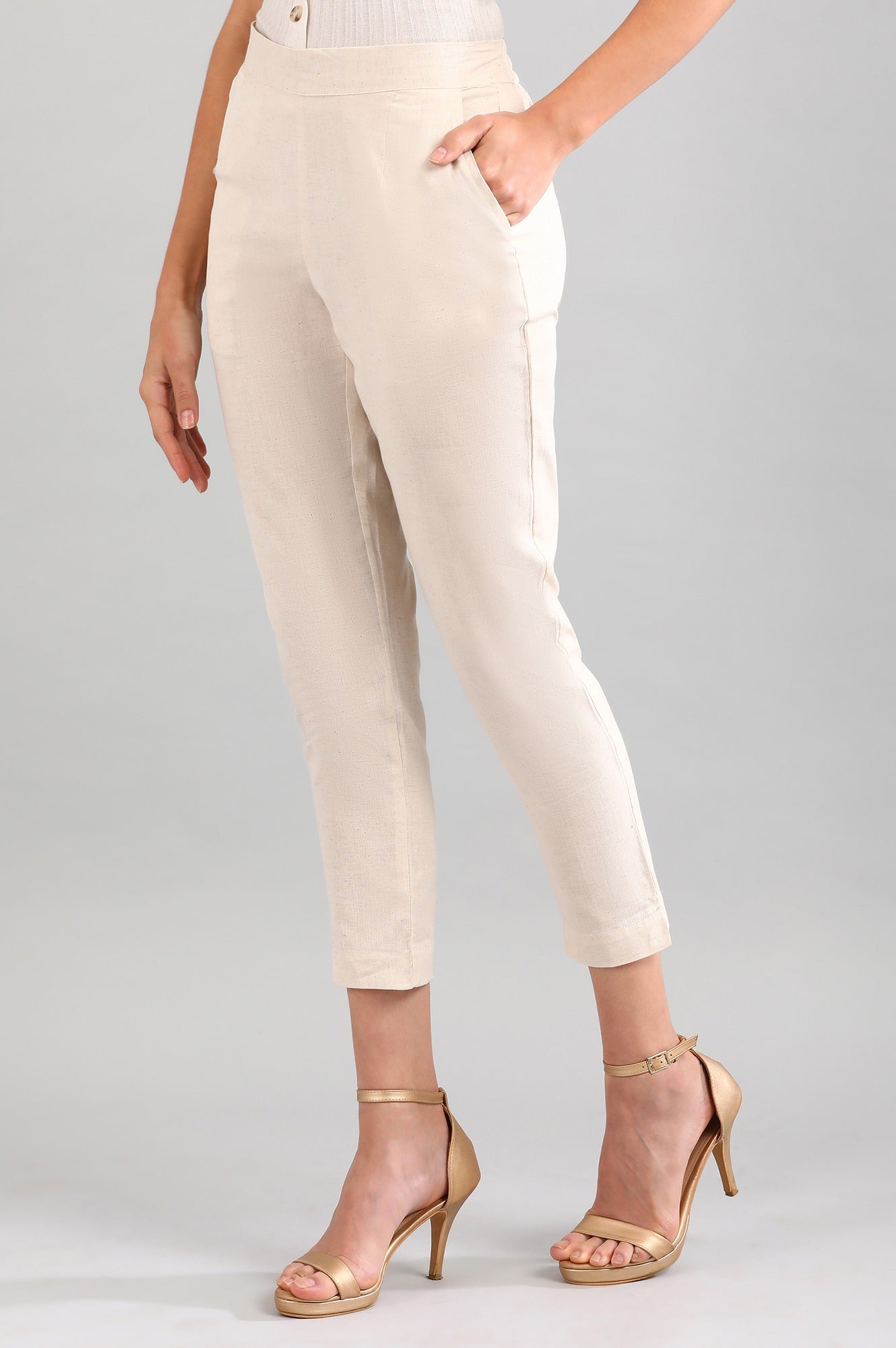 Beige Solid Straight Fit Cotton Trousers With Elasticated Back