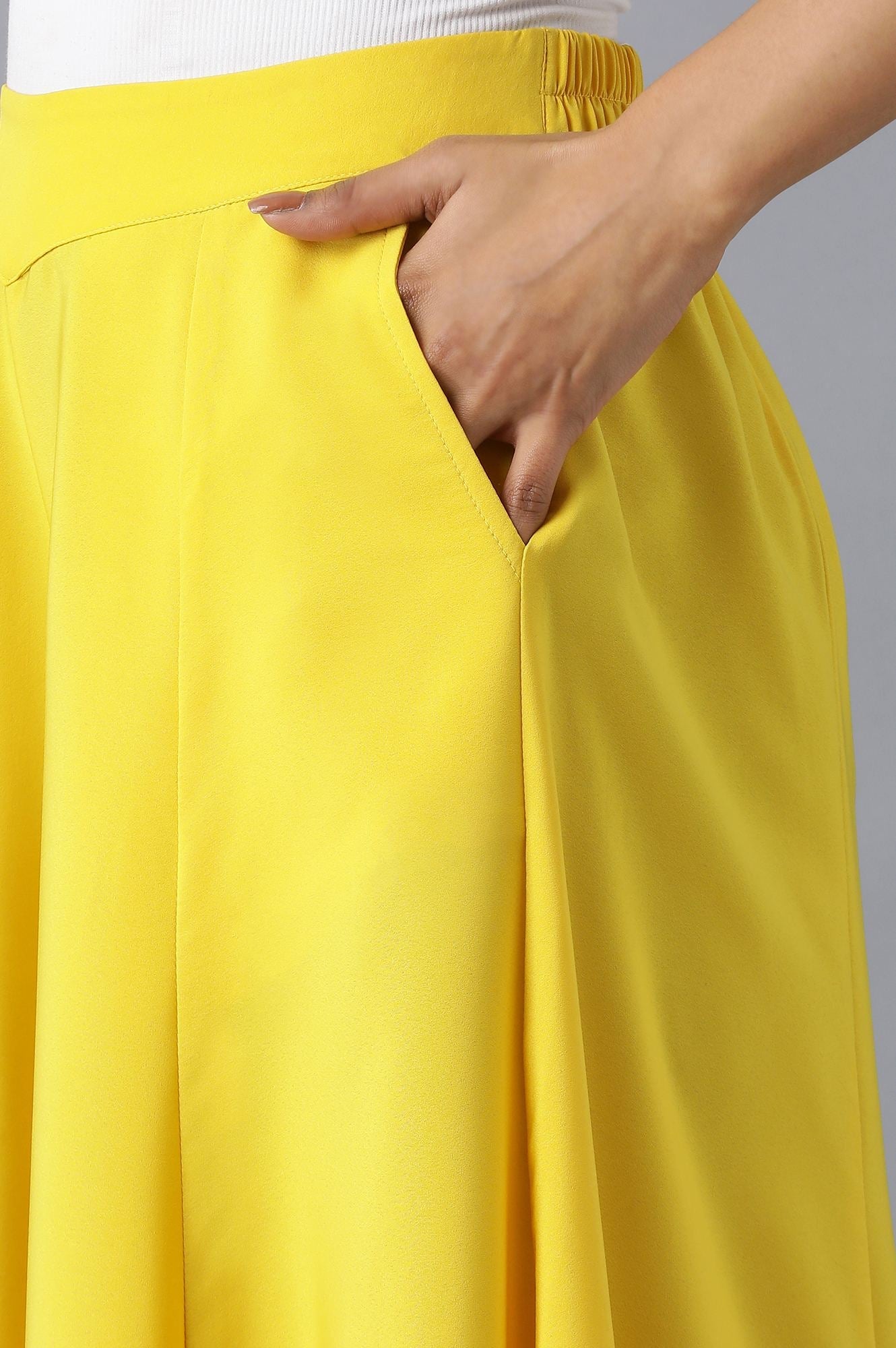 Yellow Solid Flared Woven Pants with Elasticated Waistband