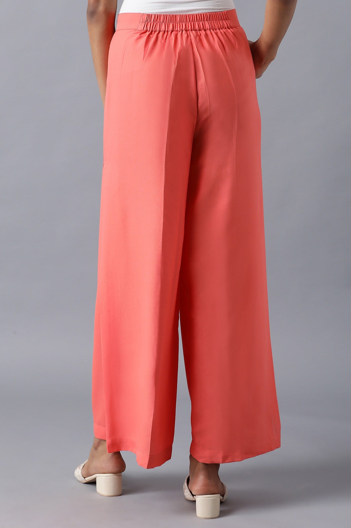 Pink Solid Flared Woven Palazzo With Side Pleats