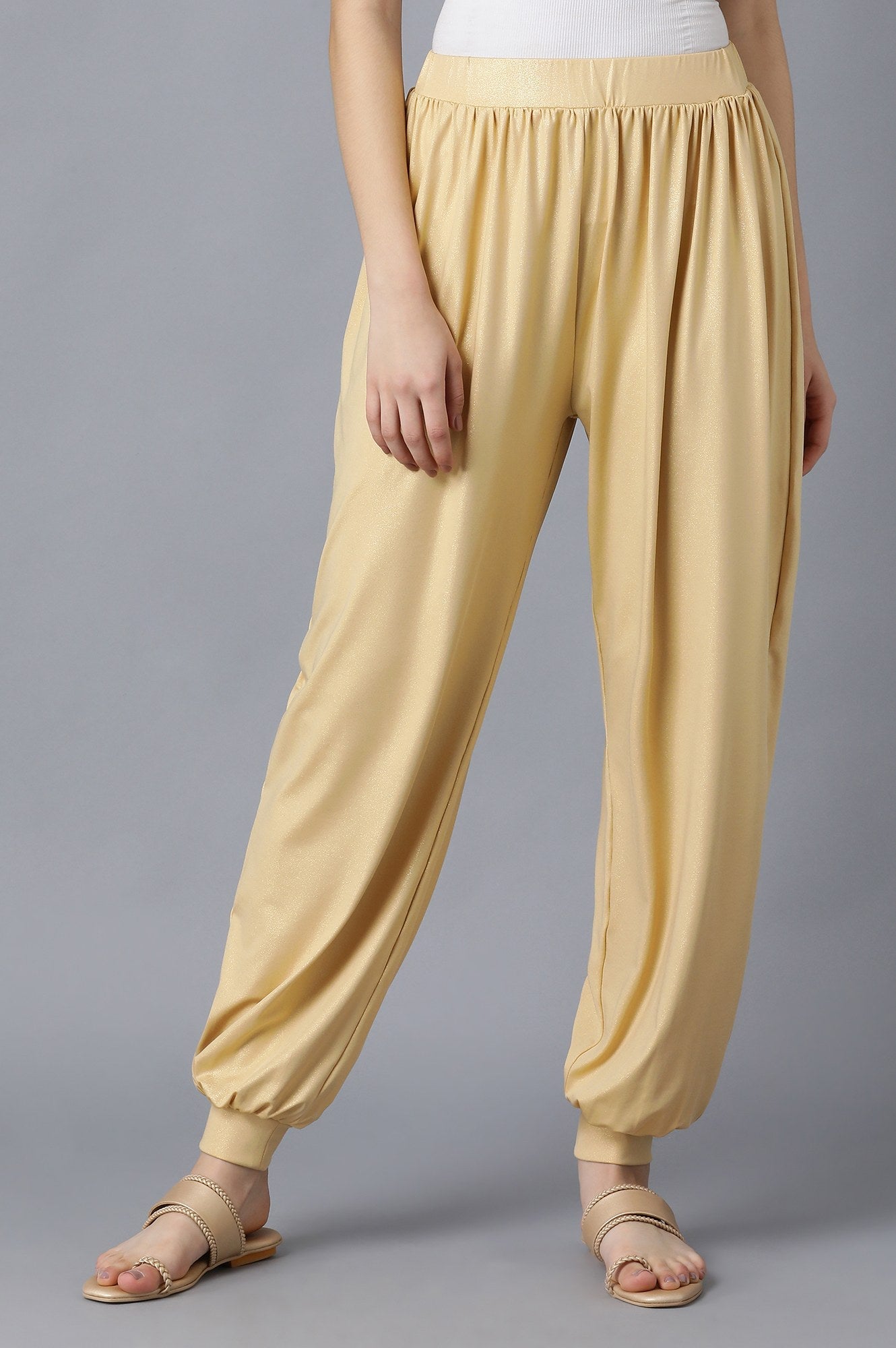 Gold Solid Loose Fit Pants With Elasticated Waist