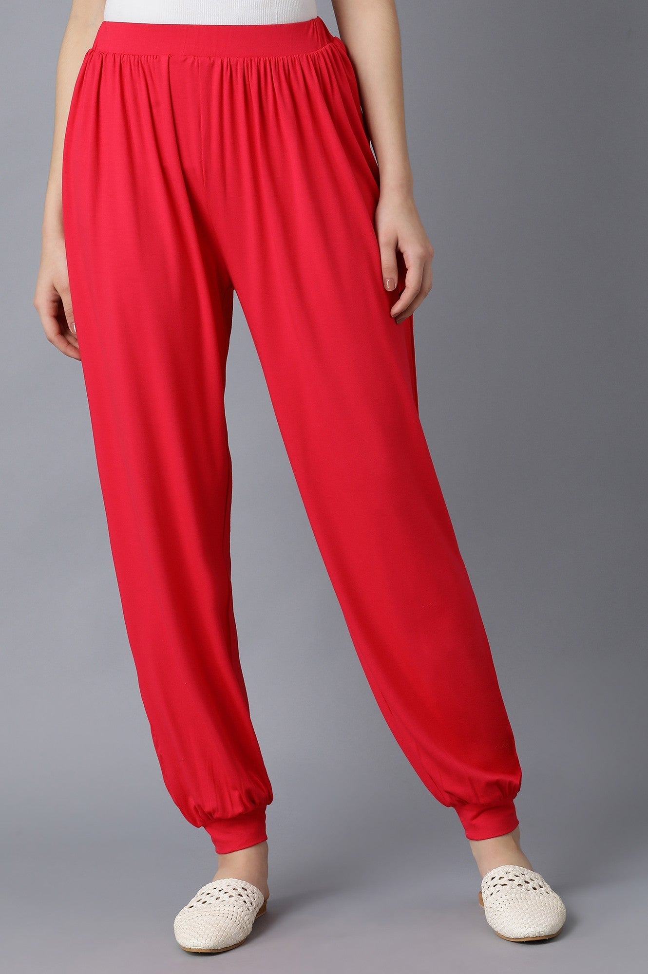 Red Solid Flared Pants With Elasticated Waist