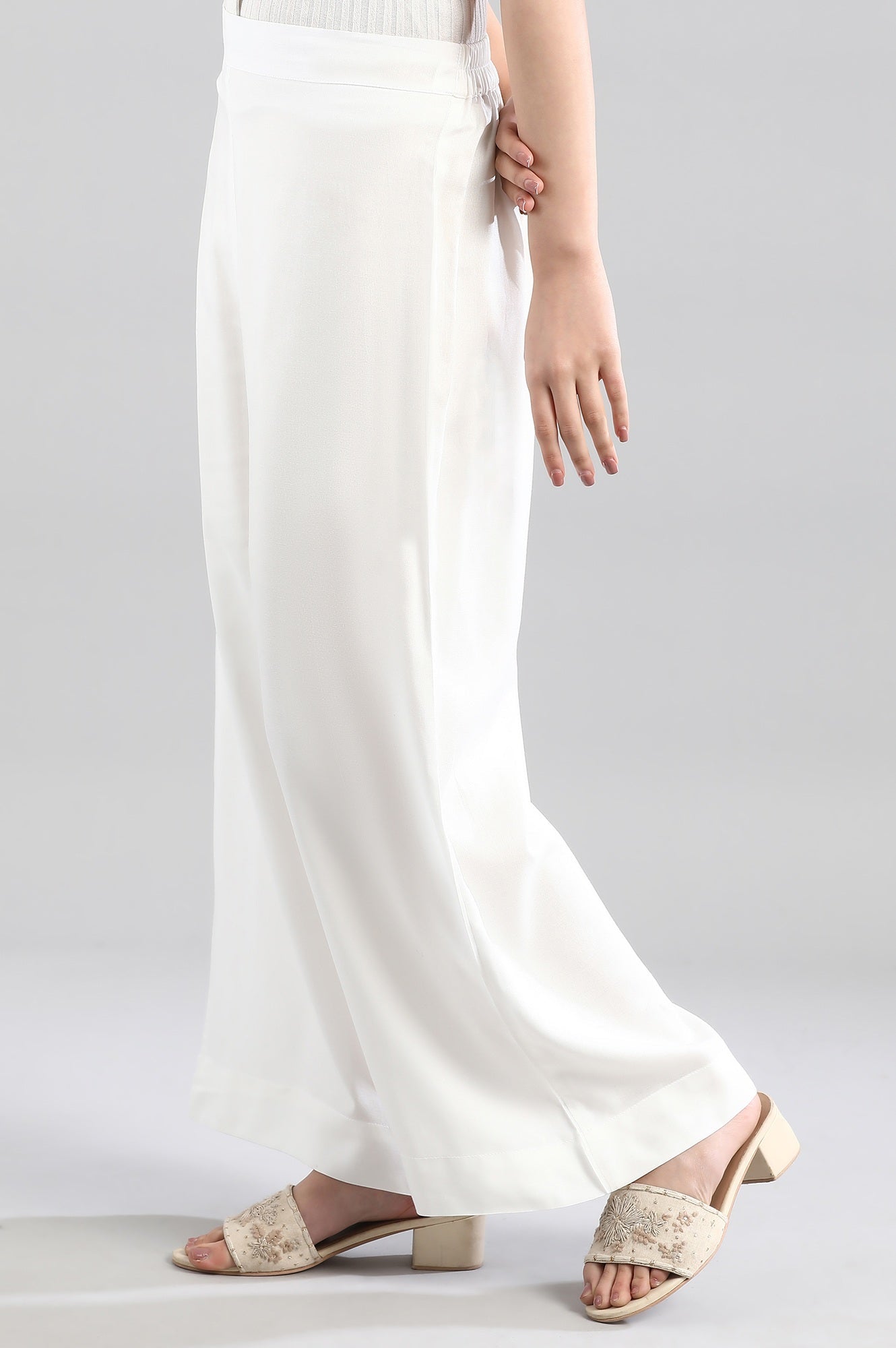 White Solid Flared Woven Palazzo With Elasticated Waistband