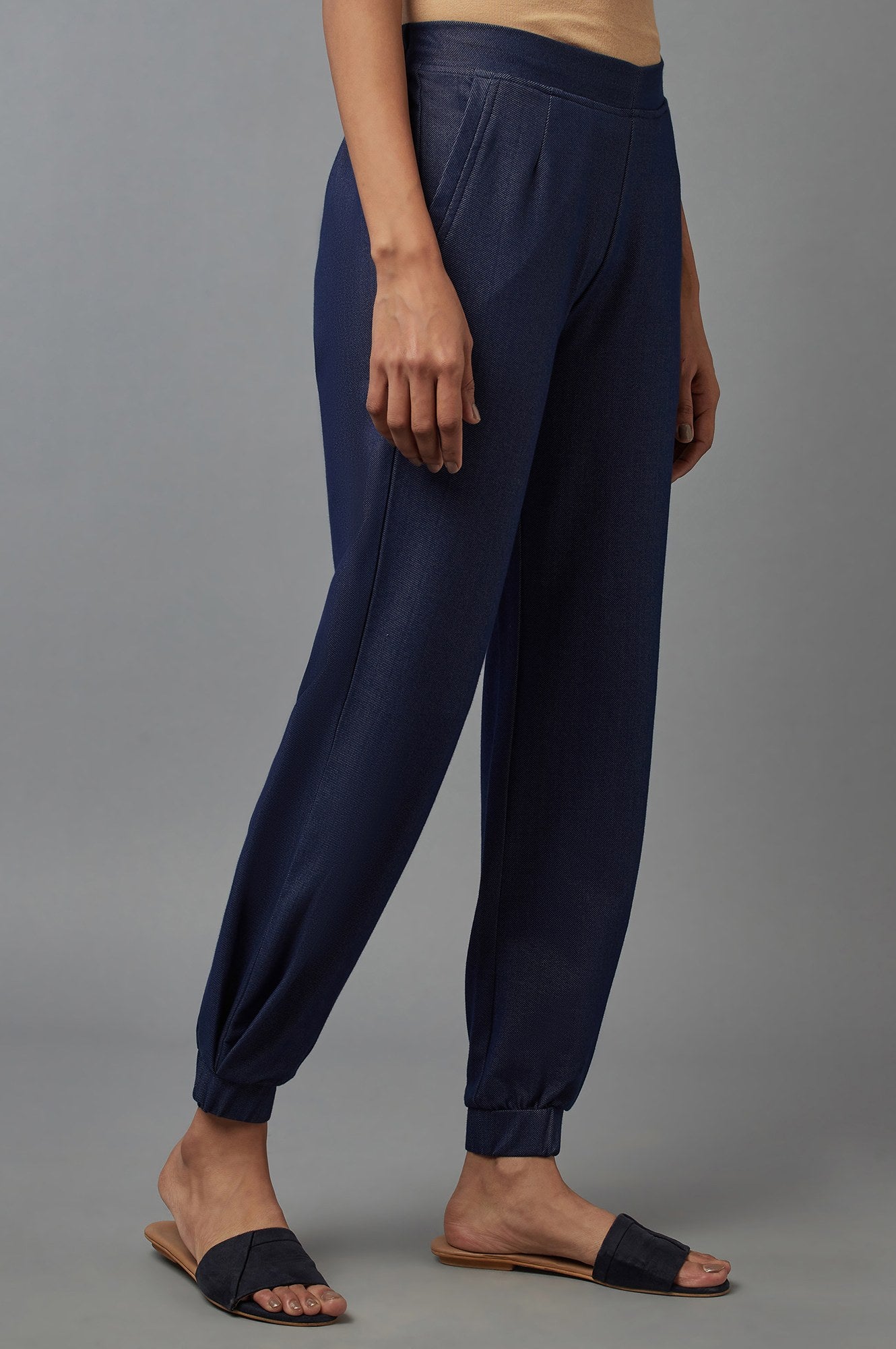 Navy Blue Solid Tapered Cotton Pants With Pleated Detail