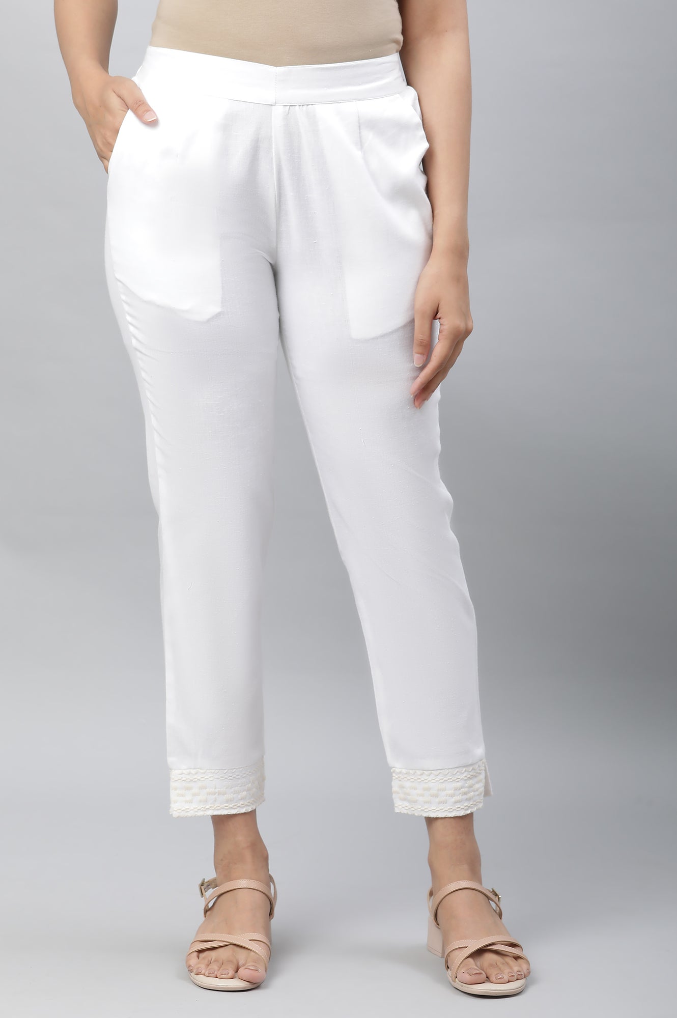 White Solid Straight Fit Cotton Trousers With Embroidered Hemline