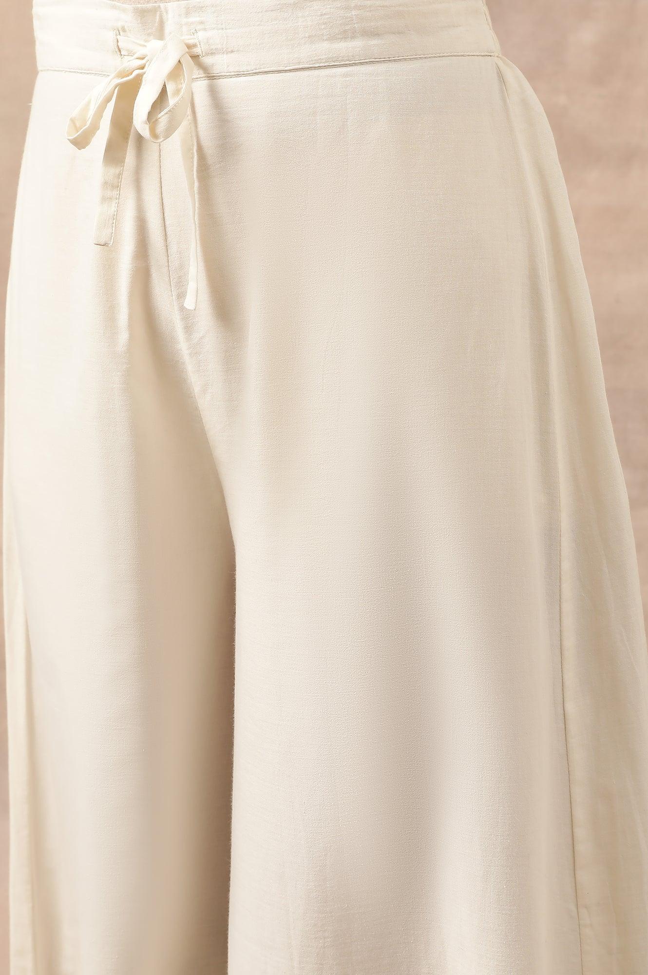 Ecru Solid Flared Pants - wforwoman