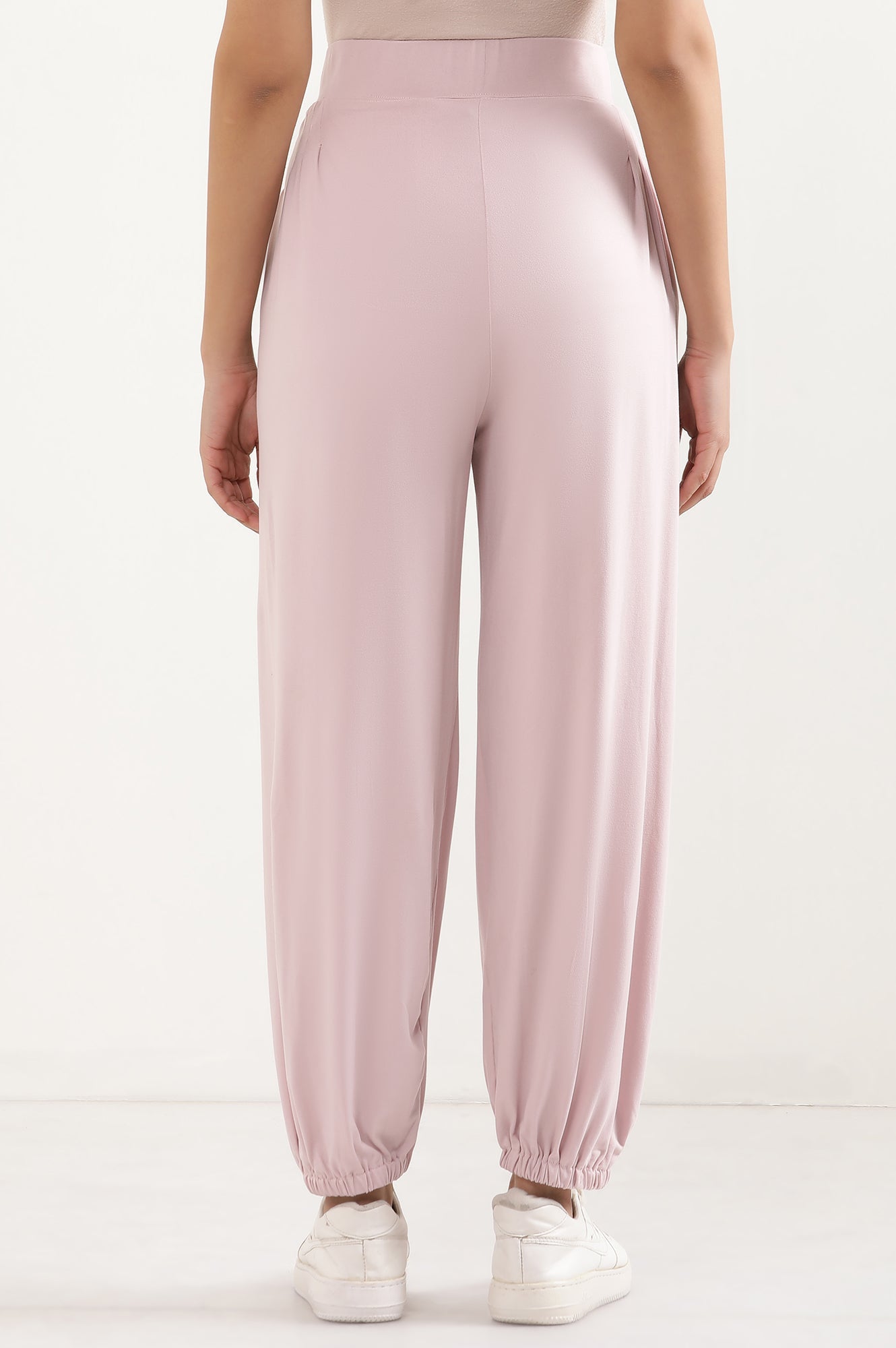 Light Pink Solid Loose Fit Pants With Pleated Detail