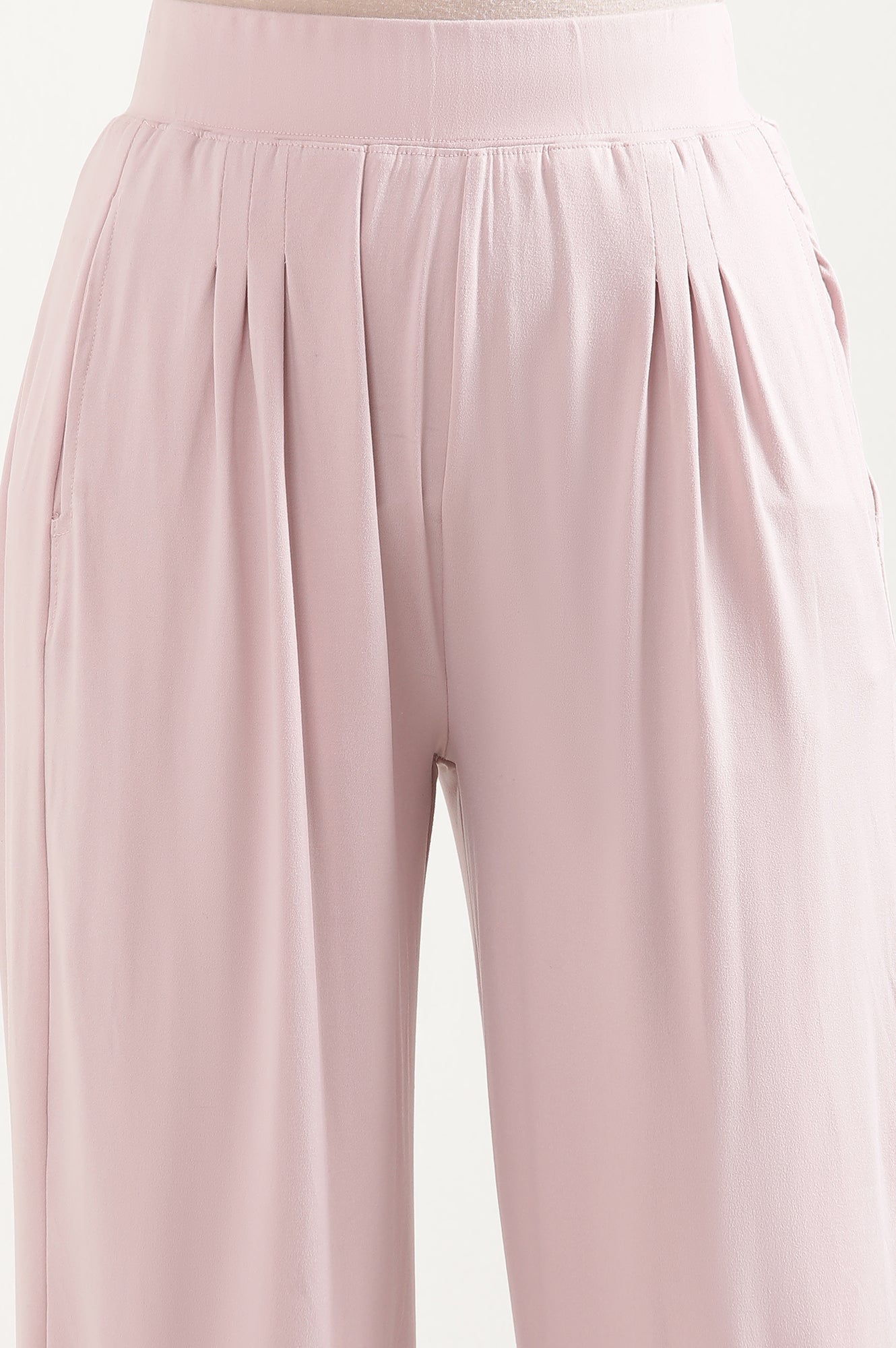 Light Pink Solid Loose Fit Pants With Pleated Detail