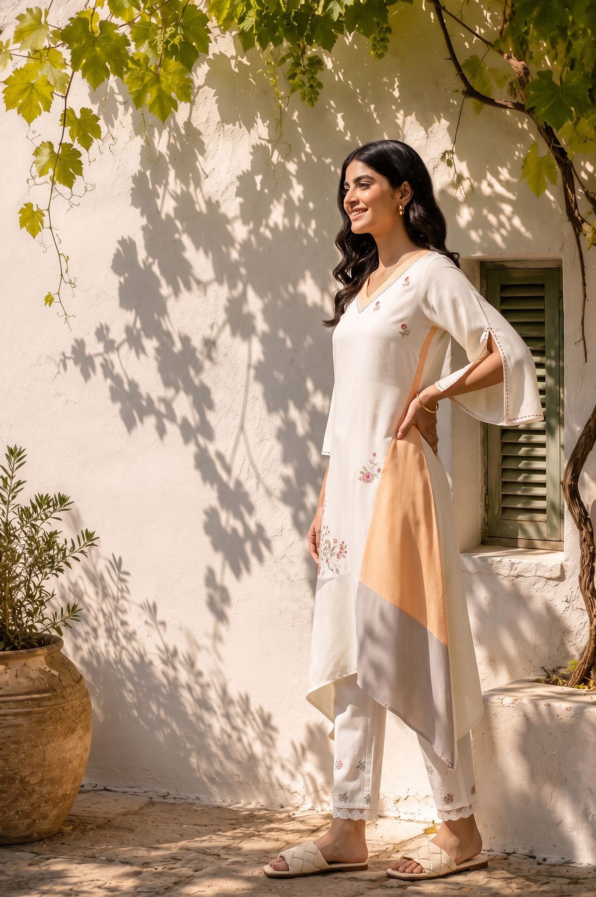 Off White Colourblocked Thread Embroidered Rayon A-line Kurta with Slim Pant Set