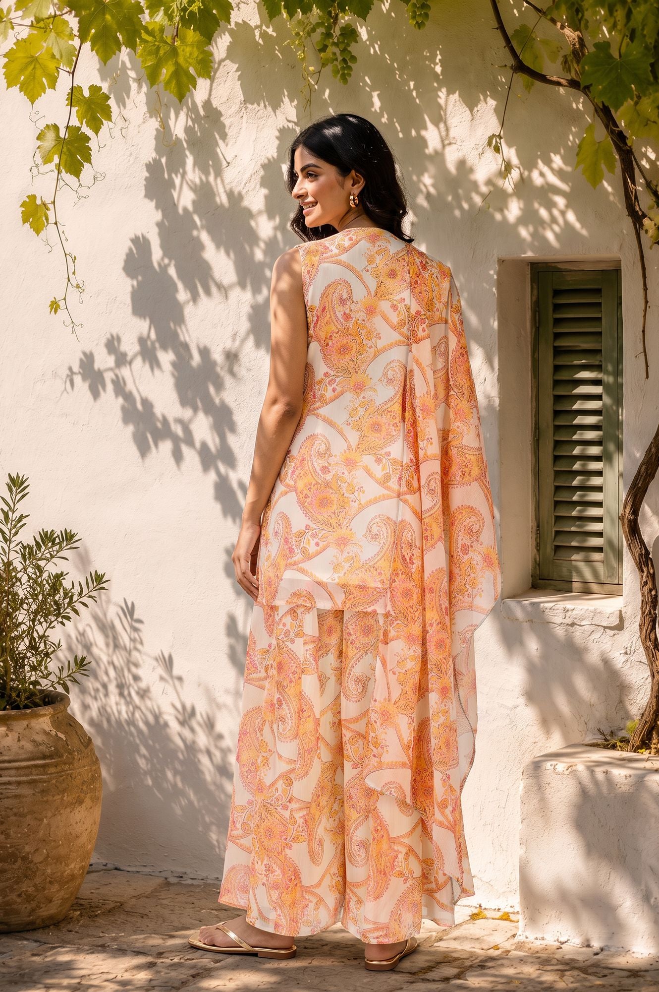 Off White Paisley Printed Chiffon Sleeveless Straight Kurta with Pants and Dupatta Set