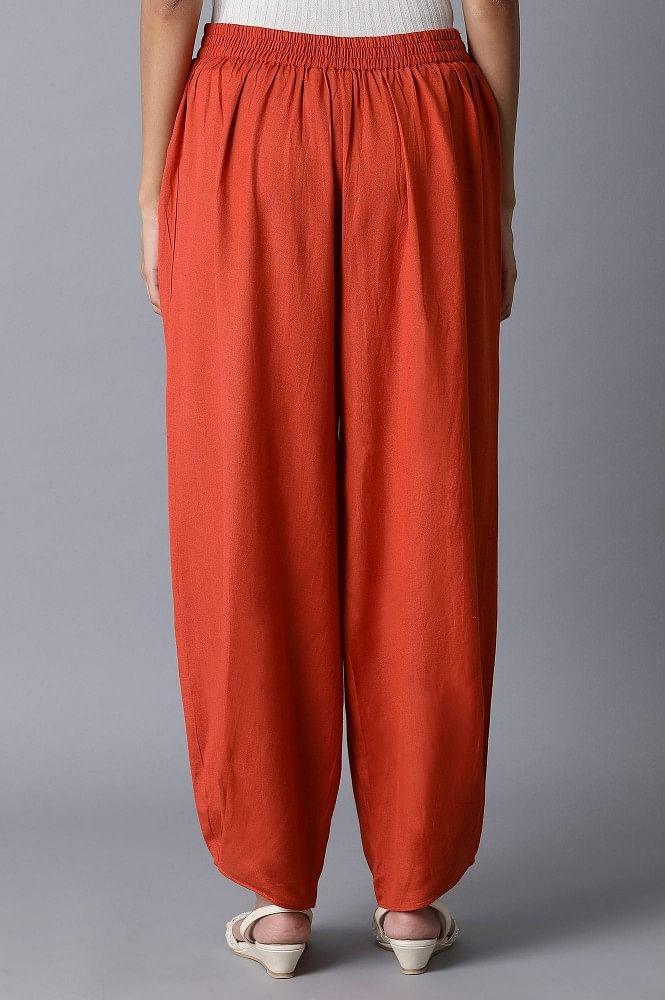 Apricot Orange Solid Pleated Carrot Pants - wforwoman