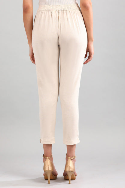 Beige Solid Straight Fit Cotton Trousers With Elasticated Back