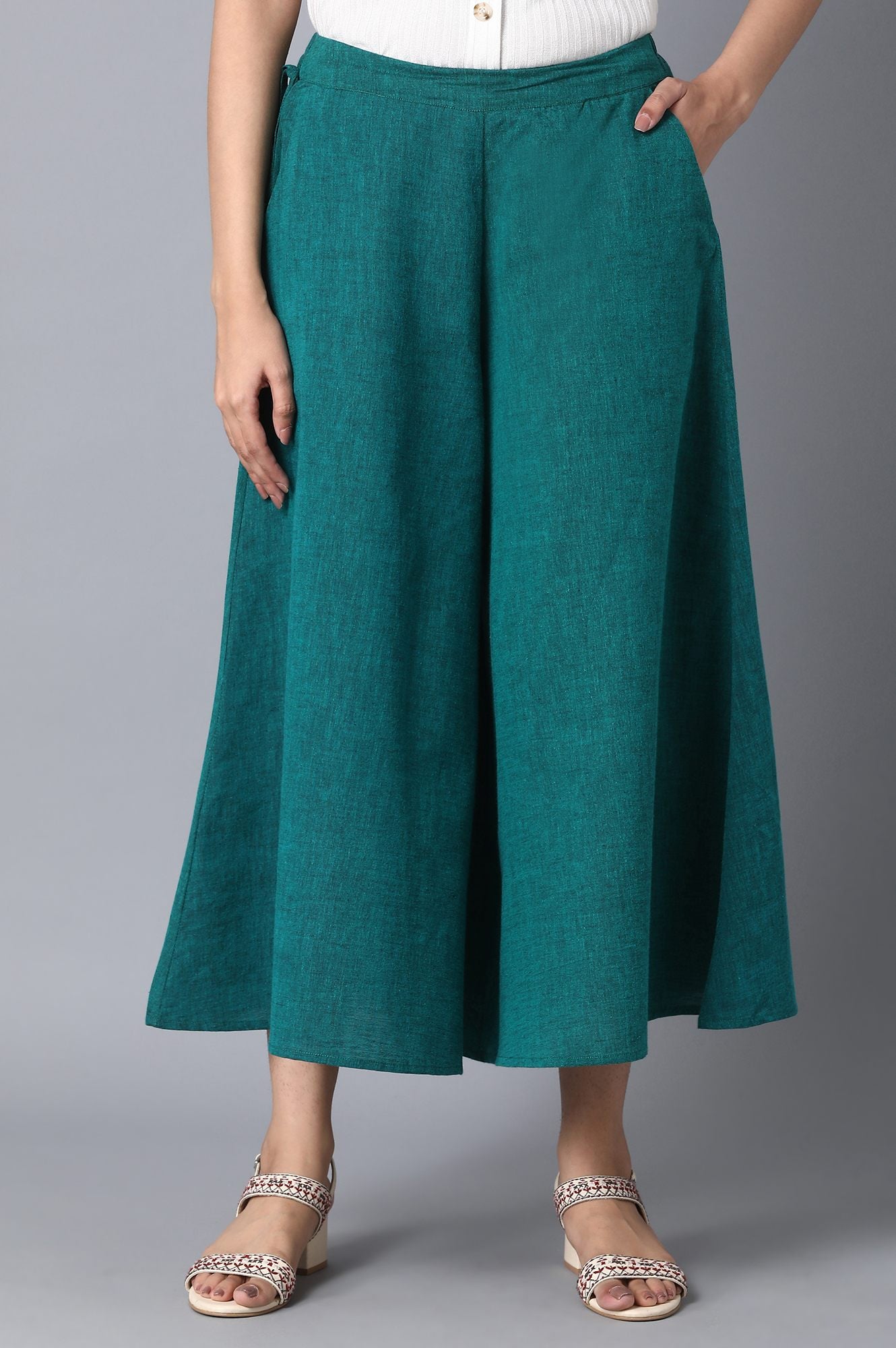 Muted Sage Green Solid Flared Cotton Culottes With Side Pockets