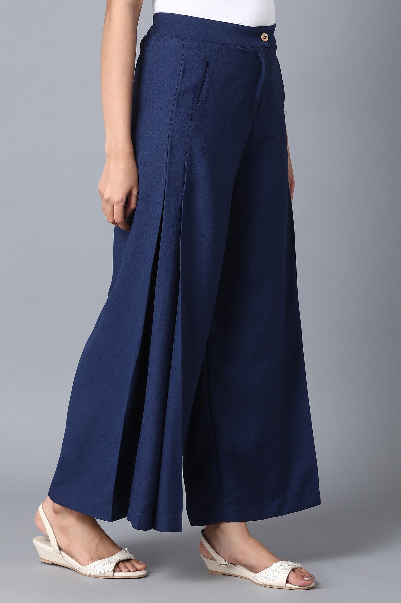 Blue Solid Flared Woven Palazzo With Front Zip Closure