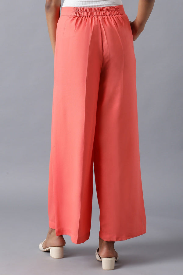 Pink Solid Flared Woven Palazzo With Side Pleats