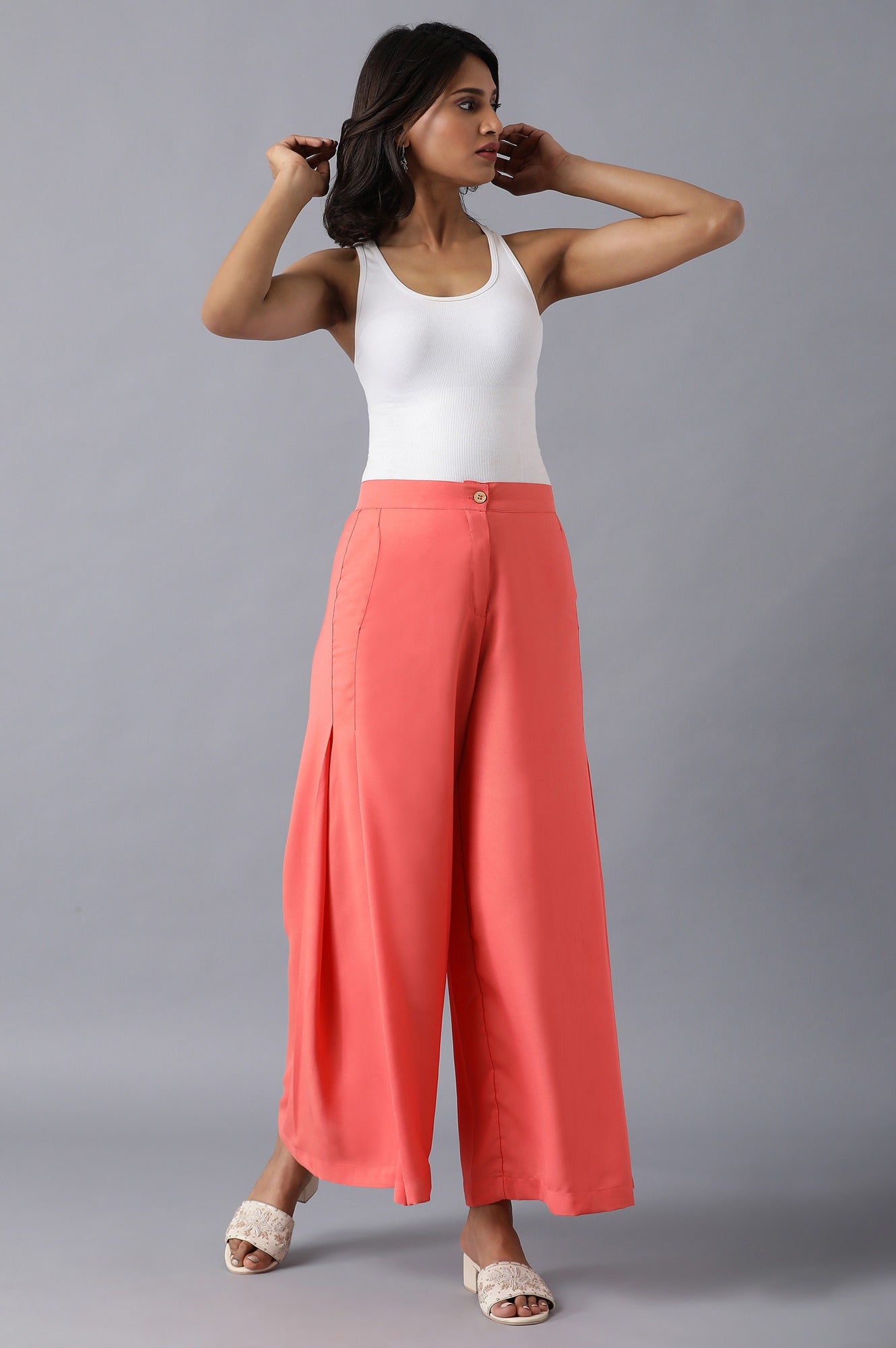 Pink Solid Flared Woven Palazzo With Side Pleats