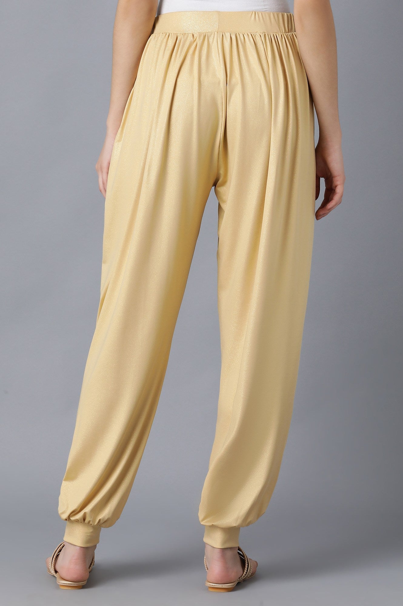 Gold Solid Loose Fit Pants With Elasticated Waist