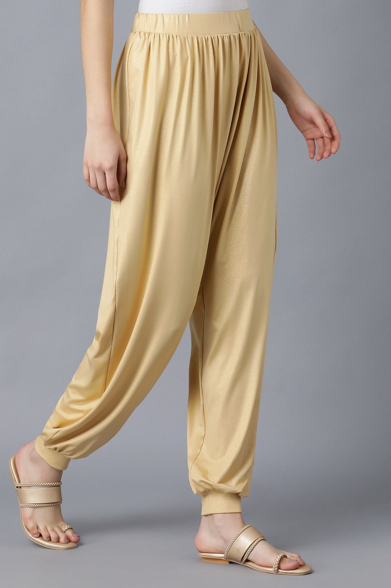 Gold Solid Loose Fit Pants With Elasticated Waist