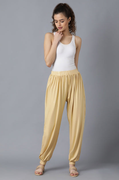 Gold Solid Loose Fit Pants With Elasticated Waist