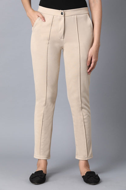 Beige Solid Tapered Pants With Front Zip Closure
