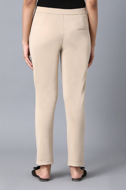 Beige Solid Tapered Pants With Front Zip Closure