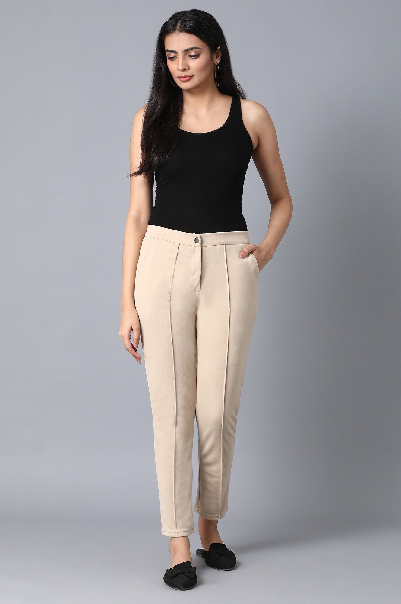 Beige Solid Tapered Pants With Front Zip Closure