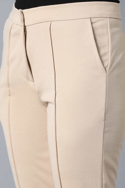 Beige Solid Tapered Pants With Front Zip Closure