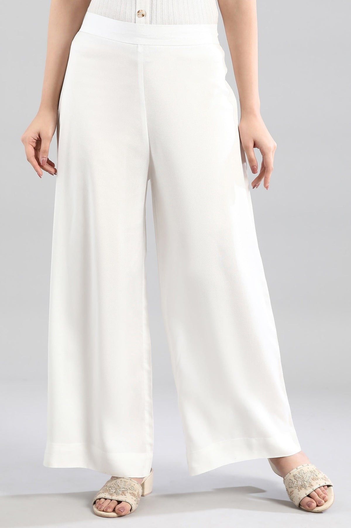 Elleven Women's White Solid Flared Woven Palazzo With Elasticated Waistband - S