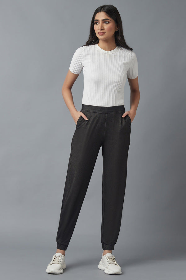 Elleven Women's Black Solid Tapered Cotton Pants With Pleated Detail