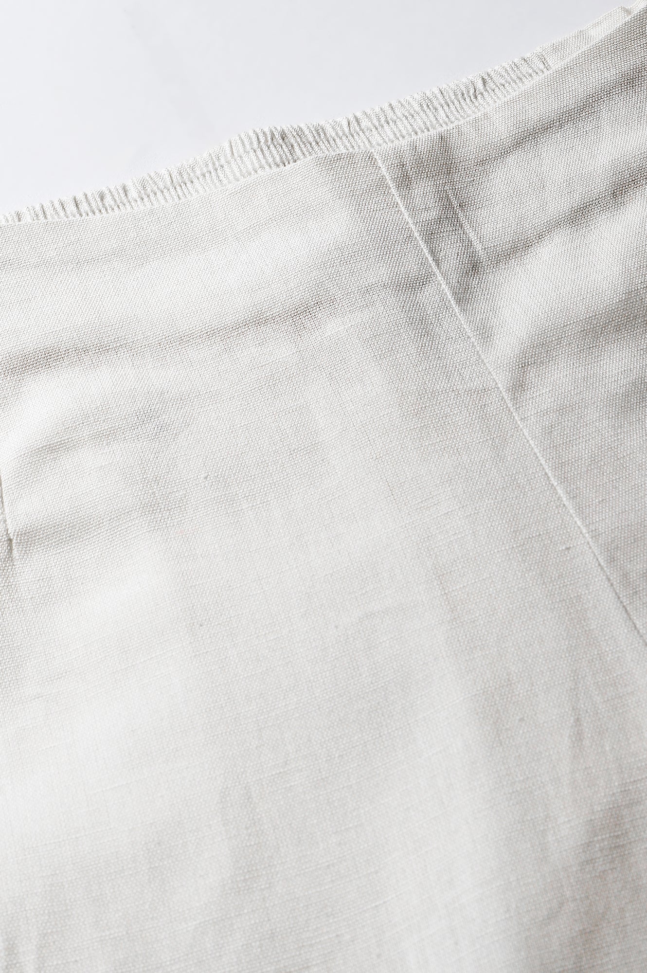 Ecru Slim Pants With Embroidered Hem