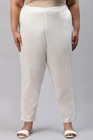Ecru Solid Light Festive Plus Size Slim Pants - wforwoman