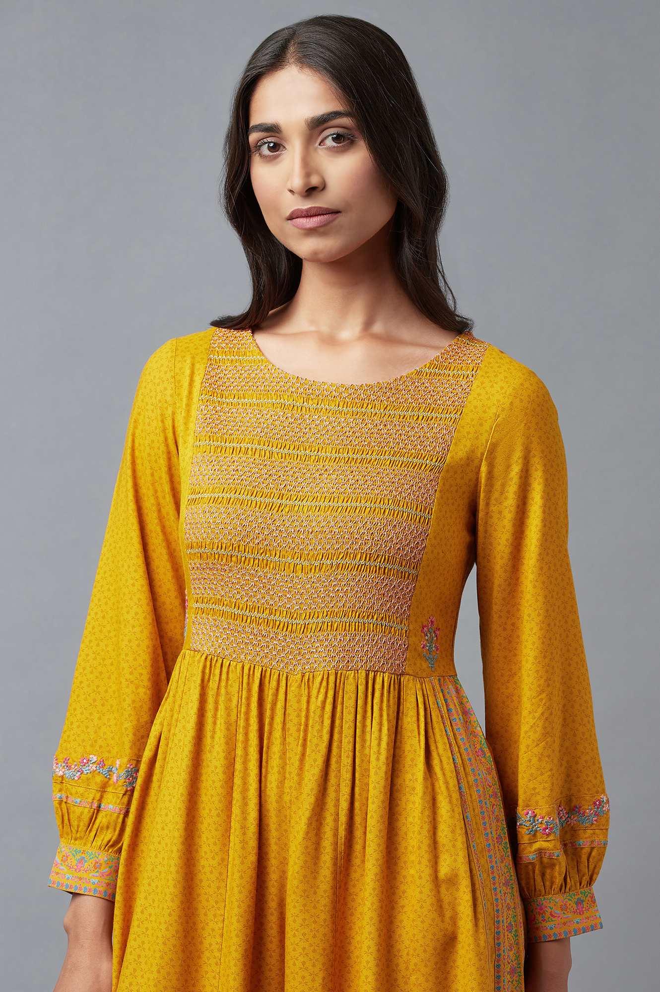 Buy Mustard Yellow Smocked Yoke Jumpsuit With Embroidery Online for Woman | WforWoman Buy Mustard Yellow Smocked Yoke Jumpsuit With Embroidery Online for Woman | WforWoman