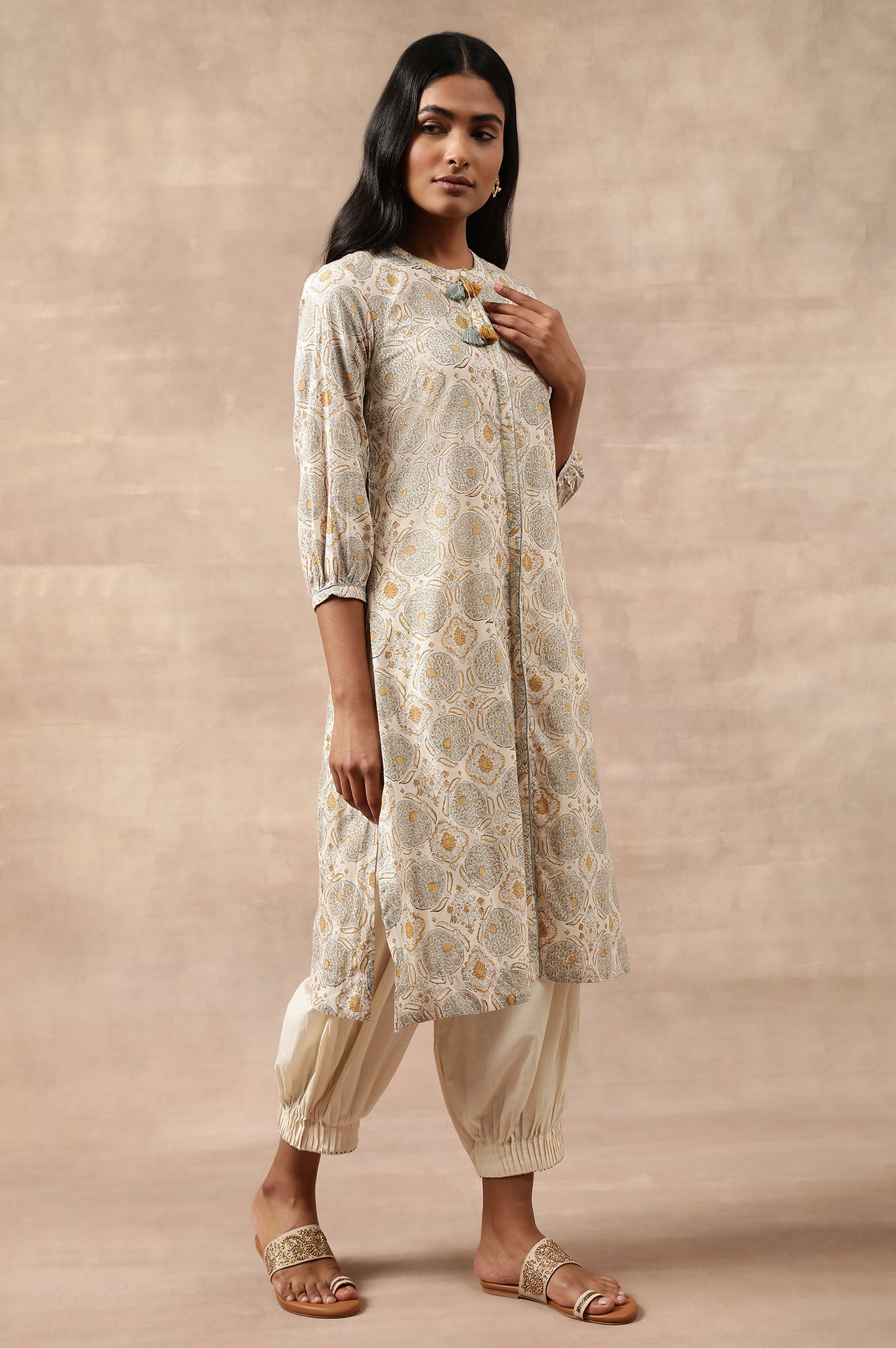 Cream Solid Beaded Tapered Cotton Salwar