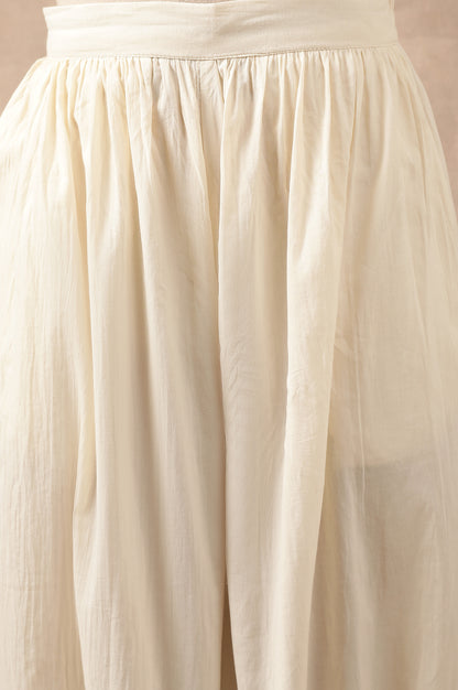 Cream Solid Beaded Tapered Cotton Salwar