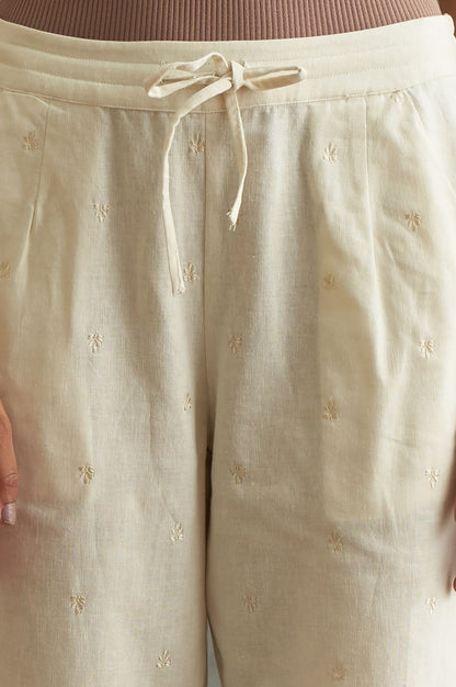 Beige Solid Embroidered Straight Cotton Pant