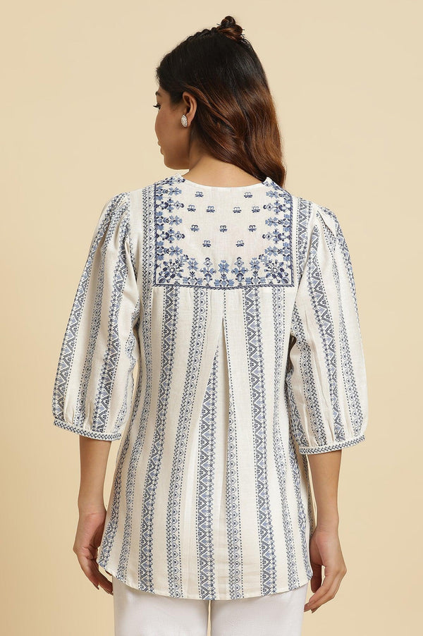 Ecru Peplum Top In Blue Print