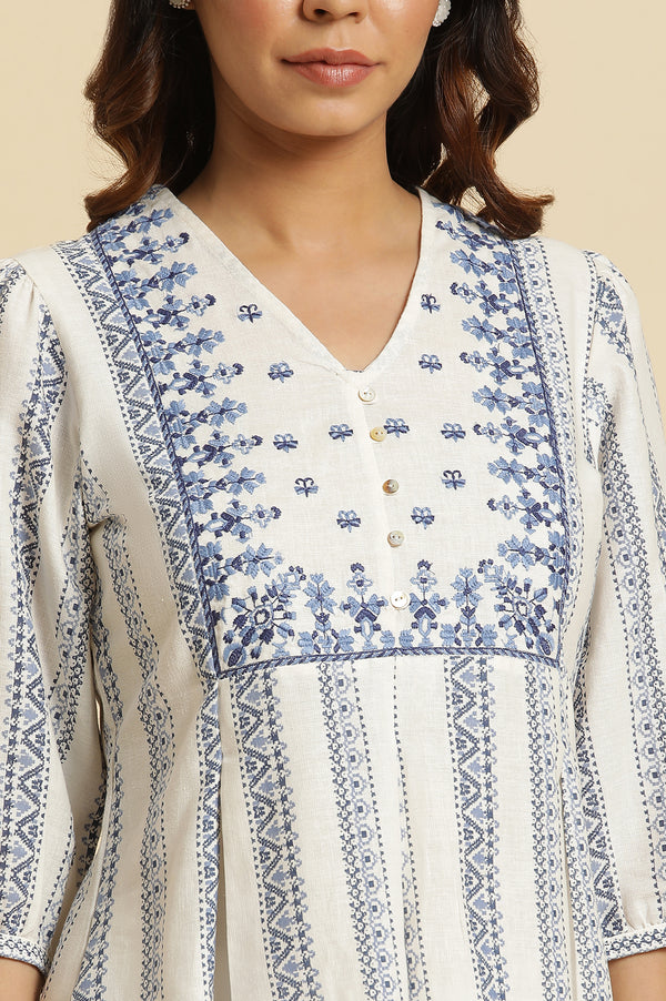 Ecru Peplum Top In Blue Print