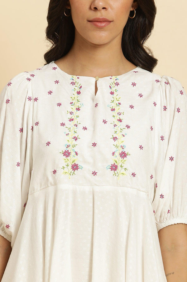 White Peplum Cotton Top with Embroidered Yoke