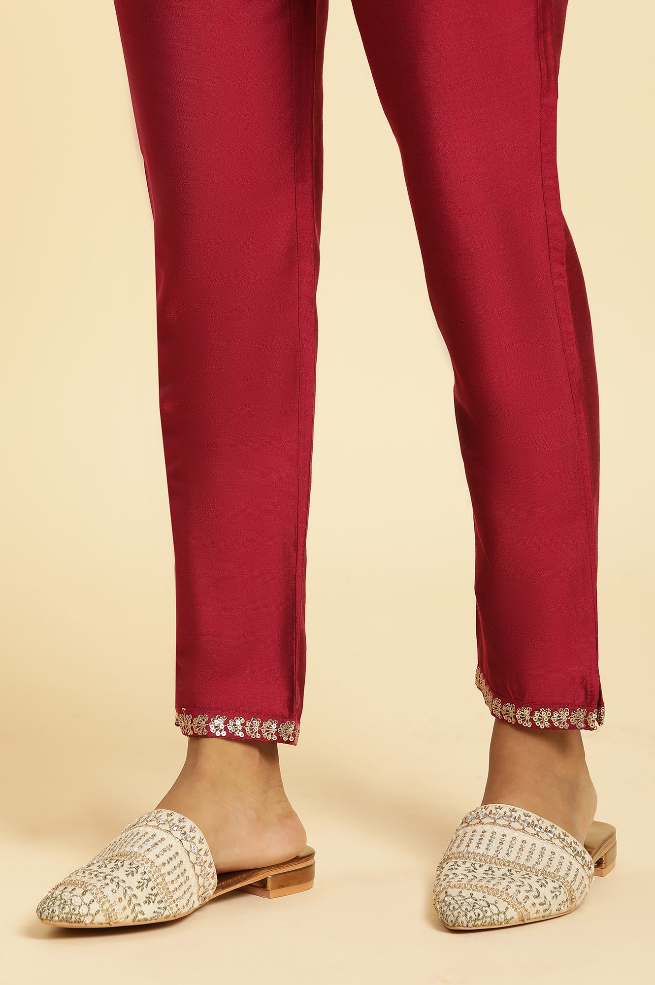 Pink Slim Pants with Embroidered Hemline