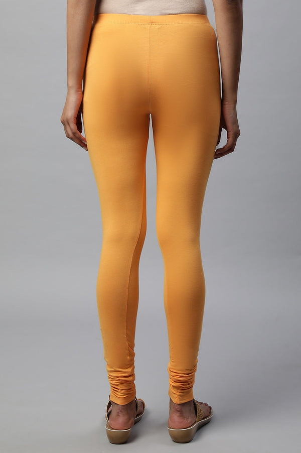 Orange Solid Skinny Fit Cotton Churidar With Elasticated Waist