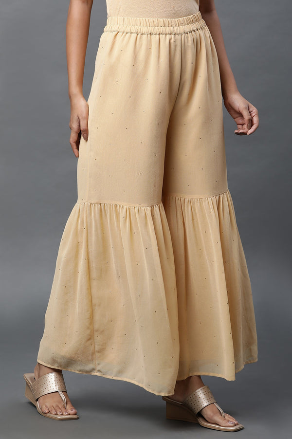 Gold Polka Dots Printed Flared Woven Palazzo With Elasticated Waist