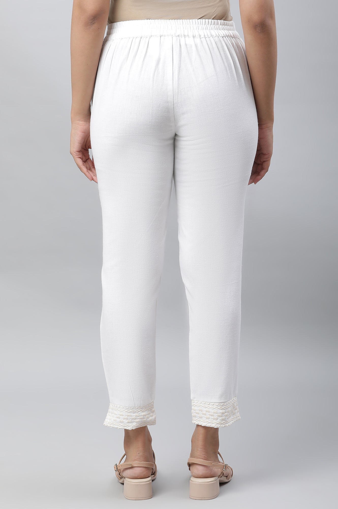 White Solid Straight Fit Cotton Trousers With Embroidered Hemline