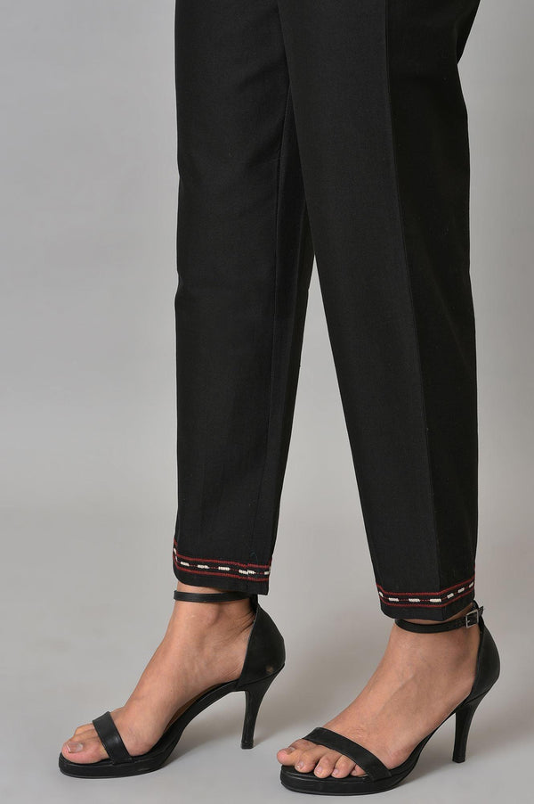 Black Slim Pants With Embroidery At Hemline