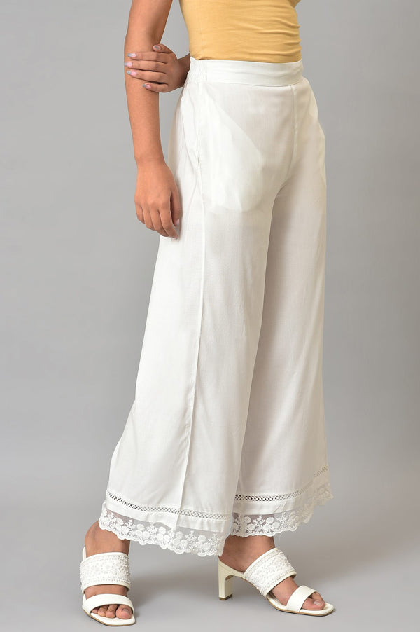Ecru Parallel Pants With Lace At Hemline