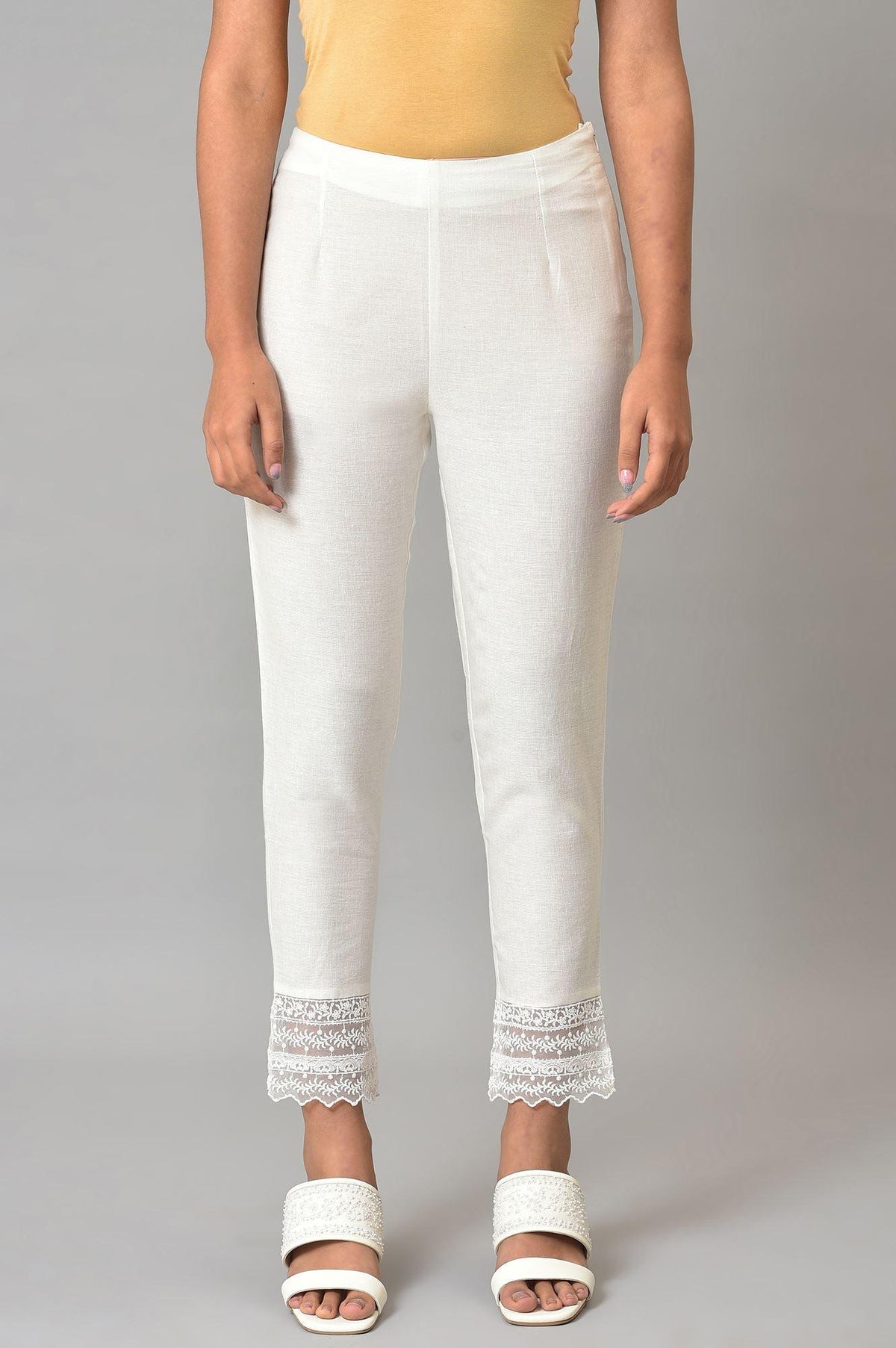 Ecru Solid Slim Pants With Lace - XS