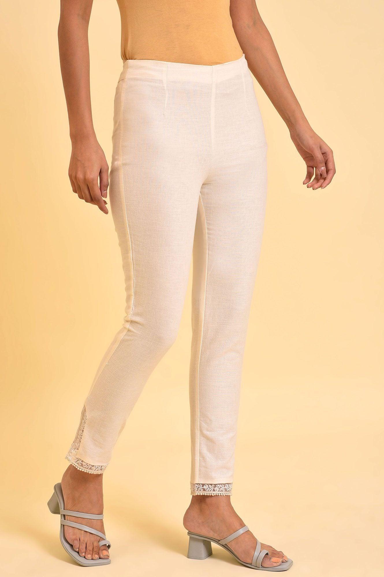 Ecru Solid Slim Pants With Lace On Hem - wforwoman