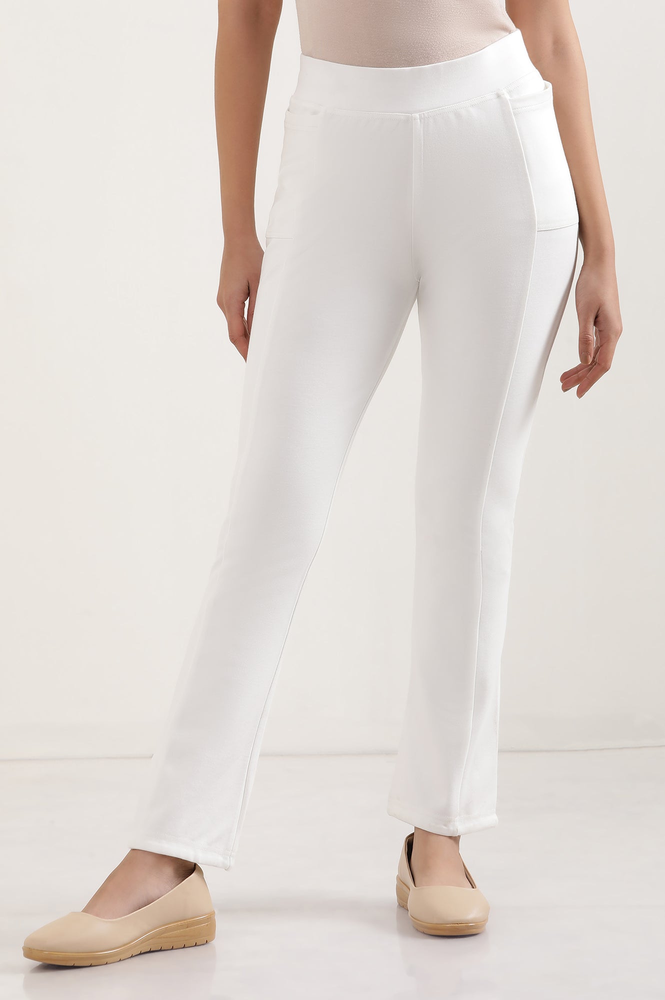 Off White Solid Boot Cut Pants With Elasticated Waist