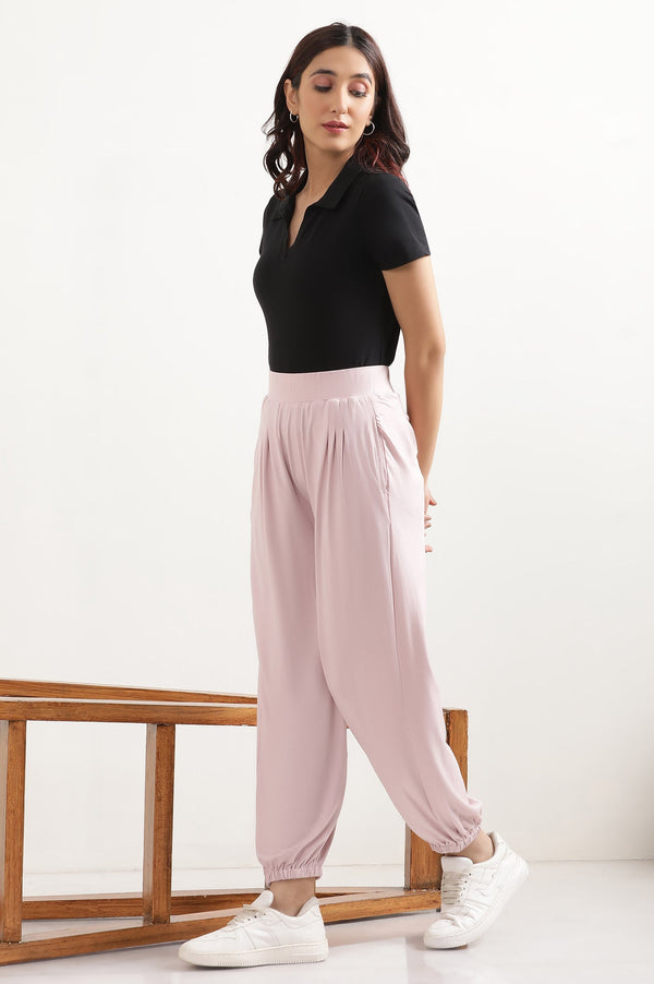 Light Pink Solid Loose Fit Pants With Pleated Detail