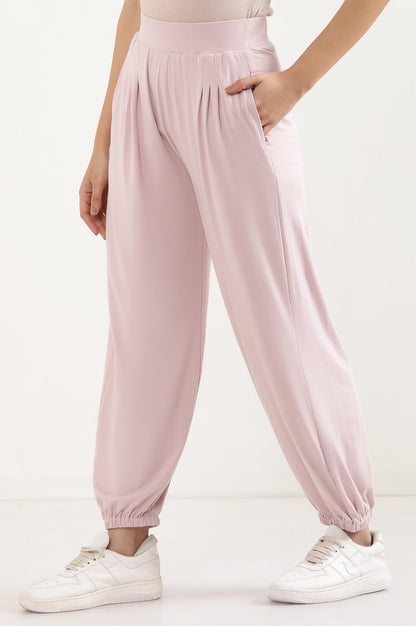 Light Pink Solid Loose Fit Pants With Pleated Detail
