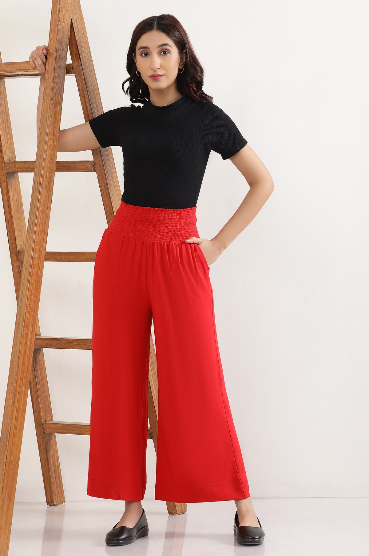 Elleven Women's Red Solid Flared Pants With Smocked Waistbelt - S